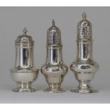 Three George III Silver Muffineers, one with slightly domed cover, by F. R., London 1750, with