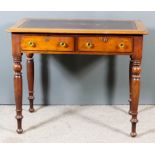 A Victorian Mahogany Rectangular Writing Table, with moulded edge and red leather inset to top,