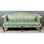 An Early 20th Century Double Scroll End Sofa of "Georgian" Design, upholstered in blue brocade,
