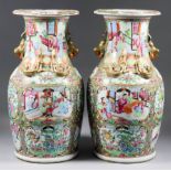 A Pair of Chinese Cantonese Porcelain Baluster-Shaped Vases, 19th Century, enamelled in colours with