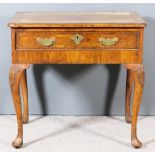 A Mid 18th Century Walnut Side Table, the quarter veneered top inlaid with herringbone banding and