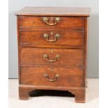 A Late George III Mahogany Beside Commode, the upper part with twin dummy drawer front, the former