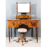 A Victorian Mahogany Kneehole Dressing Table, a George III Mahogany Toilet Mirror and a Victorian