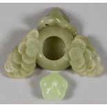 A Chinese Green Jade Brush Washer, the exterior carved with flowering branches, 3.75ins (9.5cm) x