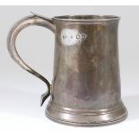 A George II Silver Tankard, possibly by Richard Bayley, London 1753, the plain tapered body with