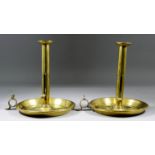 A Pair of English Brass Chamber Sticks with Pusher on Circular Base with Carrying Handle, 8ins x 9.