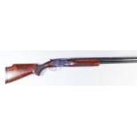 A 12 Bore Over and Under Shotgun, by Miroku, Serial No. 608378, the 30ins blued steel barrels with