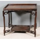 A Chinese Hardwood Rectangular Two-Tier Tray Top Occasional Table, with panelled tiers, pierced