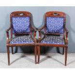 A Pair of 19th Century French Mahogany Armchairs in the Empire Manner, the arched crest rails with
