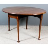 An 18th Century Mahogany Oval Dropleaf Cottage Dining Table, on turned legs and pad feet, 43ins x