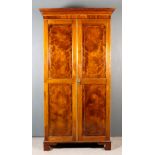 A 19th Century Mahogany Wardrobe of "Georgian" Design, inlaid with rosewood bandings and boxwood