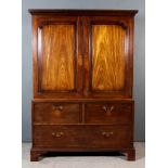 An Early George III Gentleman's "Cuban" Mahogany Wardrobe, the upper part with moulded and dentil