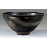 A Rare Chinese 'Jian' Ware Ash-glazed Tea Bowl, Northern Song Dynasty, 12th Century, of conical form