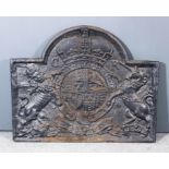 A Cast Iron Fireback, cast with the Royal Coat of Arms of Charles II, 33ins x 41ins overall