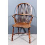 A 19th Century Yewwood and Elm Seated Stickback Windsor Armchair, with two-tier stick back, dished
