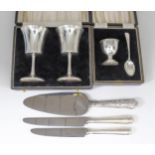A Set of Eight Elizabeth II Silver Handled and Stainless Steel Bladed Table Knives and Eight Dessert