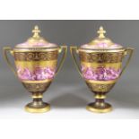 A Pair of Vienna Porcelain Two-Handled Urns and Covers, 19th Century, the bodies painted in purple