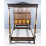 A Panelled Oak 4ft 6ins Full Tester Bedstead, of 17th Century design, the headboard with eight linen