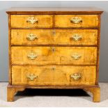 An 18th Century Walnut Chest, the top and drawer fronts inlaid with herringbone bandings and the top