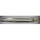 A Naval 1897 Pattern Officer's Dress Sword, 31ins bright steel blade etched with ropework and