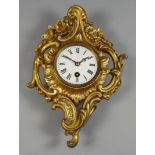 A Late 19th Century French Gilt Metal Cased Cartel Clock of Rococo Design, the 3.25ins diameter