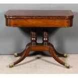 A George III Mahogany Rectangular Tea Table, with rounded front corners, inlaid with crossbandings