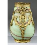 A French Opaque Green Marbled Glass Vase, Late 19th Century, with applied embossed gilt metal mounts