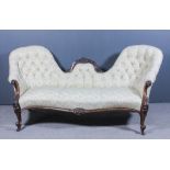 A Victorian Rosewood Framed Twin Spoon Back Settee, with carved and moulded centre cresting, moulded