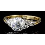 A Diamond Ring, Modern, in 18ct gold mount, set with a central round brilliant cut solitaire,