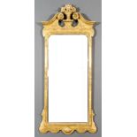 A Gilt Framed Rectangular Wall Mirror of "Early 18th Century" Design, the gilt tooled cresting