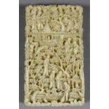 I* A Chinese Cantonese Ivory Rectangular Card Case, 19th Century, deeply carved with figures in a