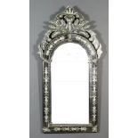 An Arched Topped Rectangular Wall Mirror in the Venetian Manner, the top with shaped and cut