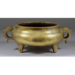 A Chinese Bronze Two-Handled Censer, 19th Century, the bulbous body on three stump feet, 7.75ins (