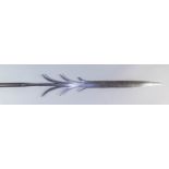 A Barbed Steel Spear, 20th Century, the six barbed steel blade with hardwood shaft and steel spike