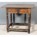 A 17th Century Oak Side Table, with plain cleated top, fitted one frieze drawer with twin moulded