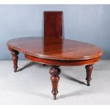 A Late Victorian Mahogany Oval Extending Dining Table, with two extra leaves, with deep moulded edge