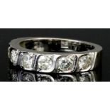 A Diamond Half Hoop Eternity Ring, Modern, in 18ct white gold mount, set with seven round