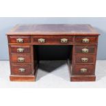 A Late Victorian Walnut Kneehole Desk, and a George III Mahogany Armchair, the kneehole desk with