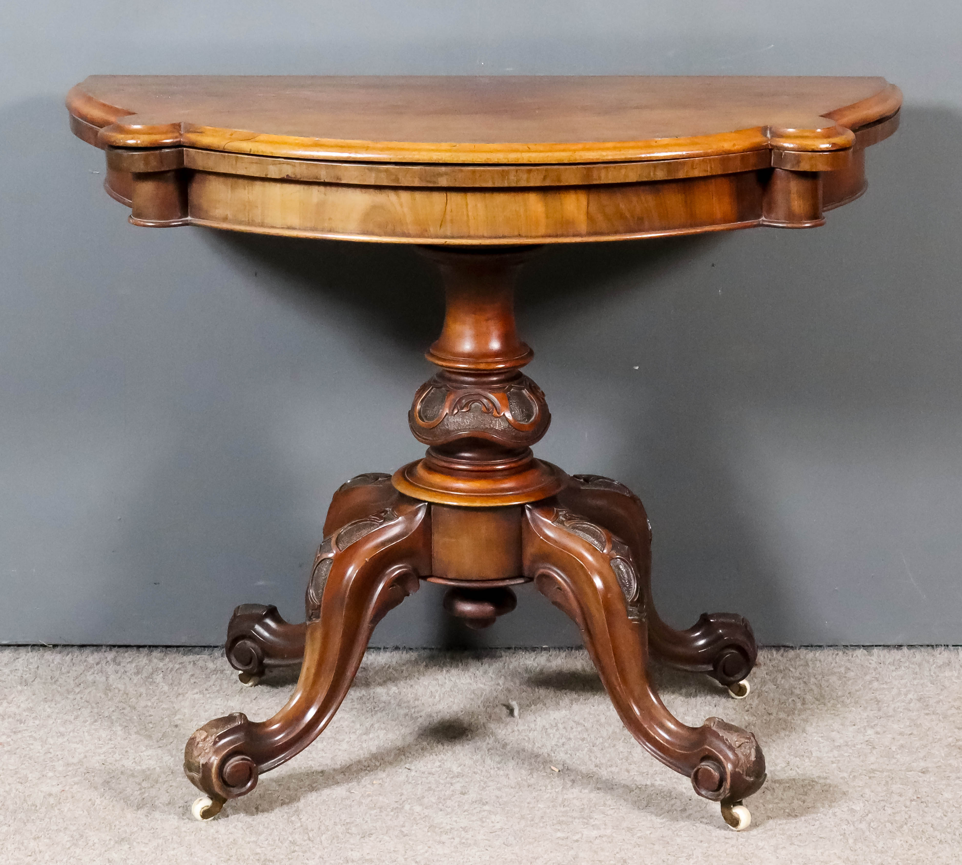 A Victorian Walnut Card Table, made by Saml. Webb & Co