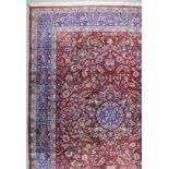 A Bidjar Carpet, woven in colours with central leaf filled medallion, the field filled with trailing