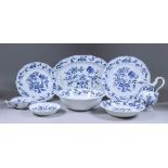 A Continental Blue and White Dinner Service Printed with the Meissen "Onion Flower" Design within