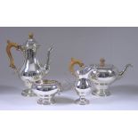 An Elizabeth II Silver Baluster Shaped Four-Piece Tea and Coffee Service, by William Comyns &