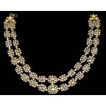 A Diamond and Enamel Necklace and a Pair of Matching Earrings, the two-strand necklace of