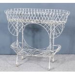 A Late Victorian White Painted Wirework Oval Jardiniere, with conforming undertier and on scroll