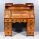 The Britisher Desk - Late Victorian Panelled Walnut Kneehole Bureau, the upper part with shaped