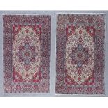 Two Tabriz Rugs, one woven in colours with central medallion and conforming spandrels, field