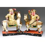 A Pair of Chinese Carved, Polychrome and Gilt Wood Figures of Jiang Jin on Horseback, each with a