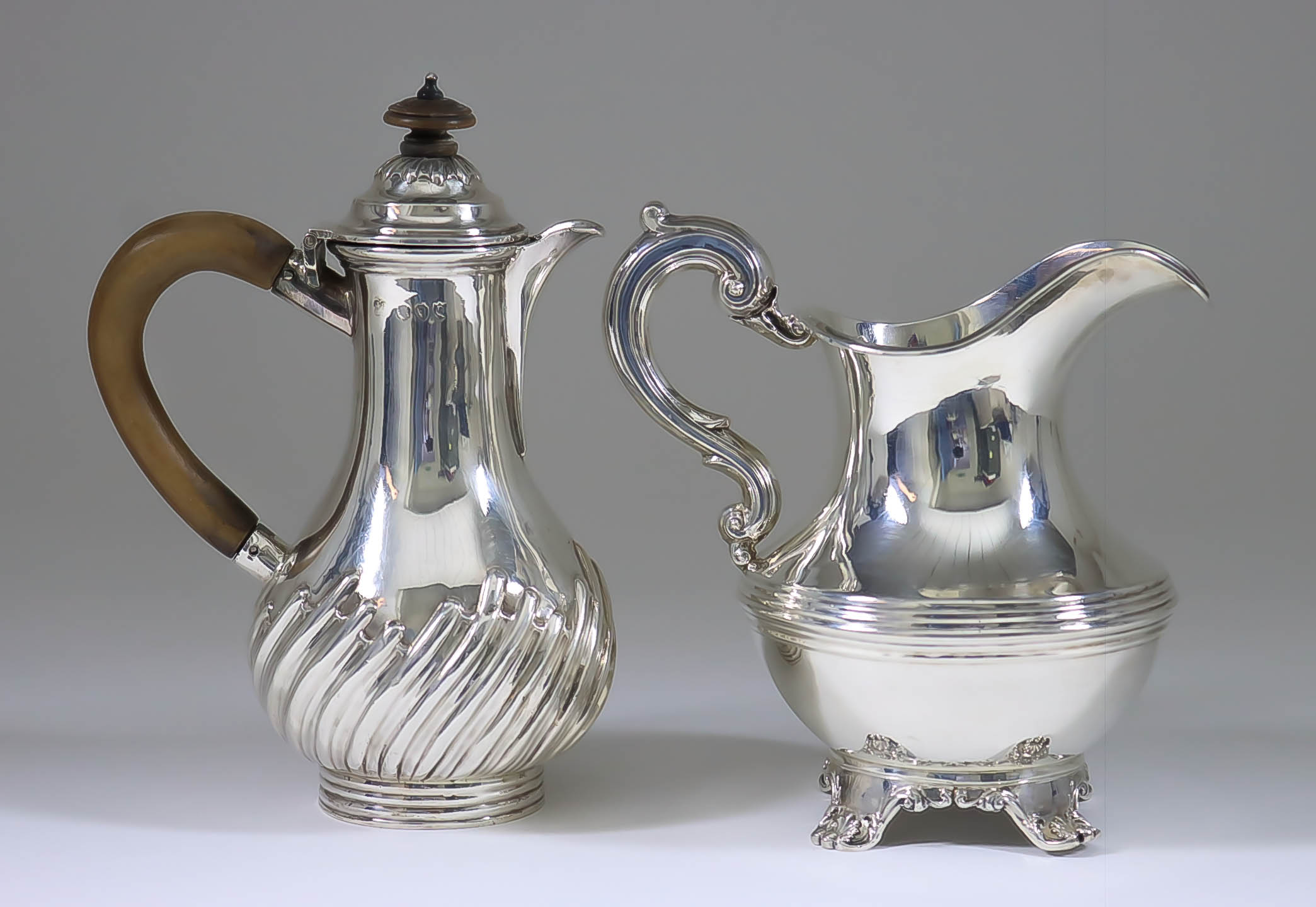 A Victorian Silver Baluster Shaped Hot Water Pot and a Victorian Silver Milk Jug, the hot water by