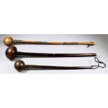 A South African Knobkerrie, Late 19th Century/Early 20th Century, the shaft with three fields of