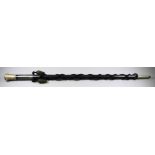 The Royal Pay Corps, Ebonised Staff, with black cords, silvery metal ferrule and plated top,